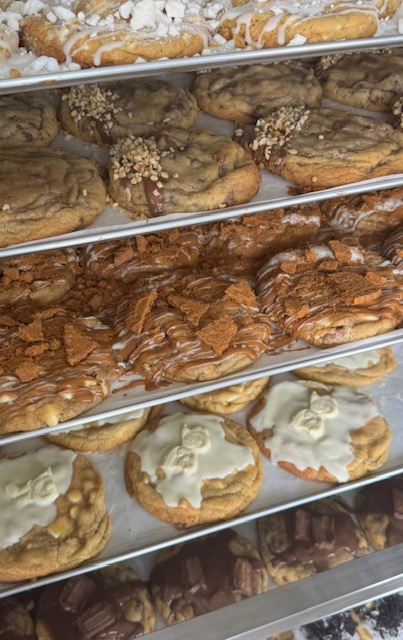 Trays of freshly baked loaded cookies