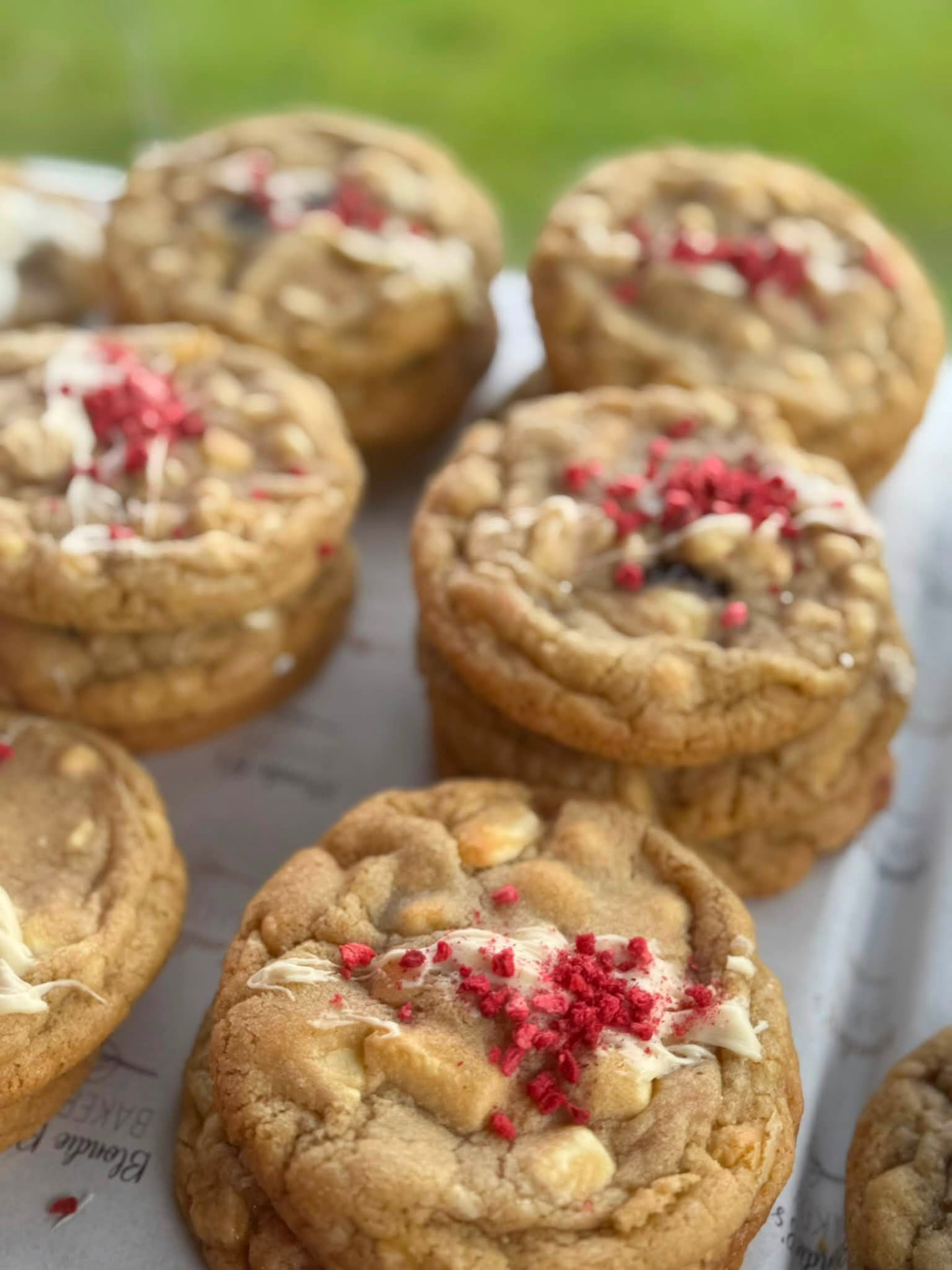 Loaded cookies topped with white chocolate and raspberry